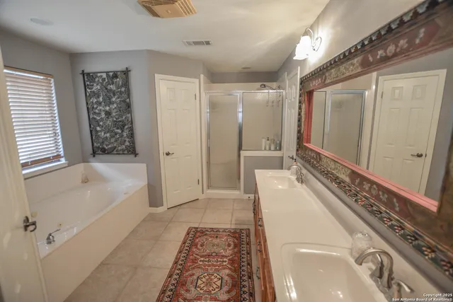 a view of a backyard with large trees