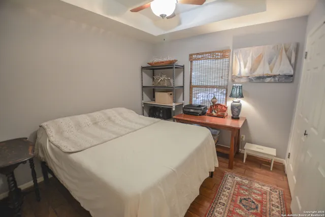 a view of a water with a house in the background