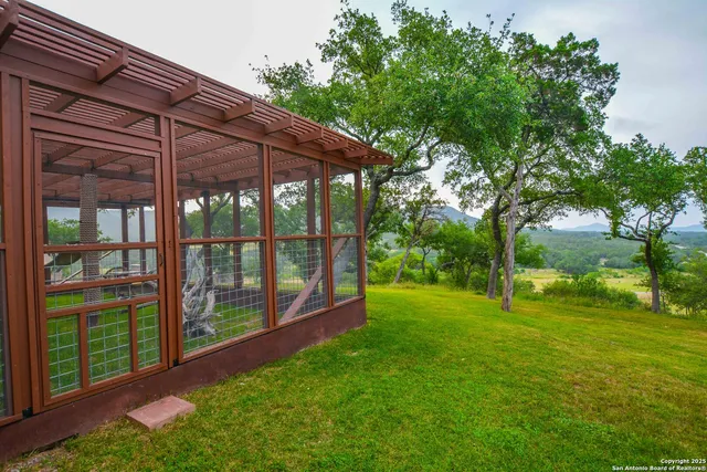a living room with furniture chandelier and a chandelier