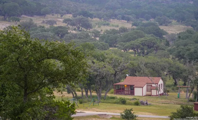 a view of a lake with a yard