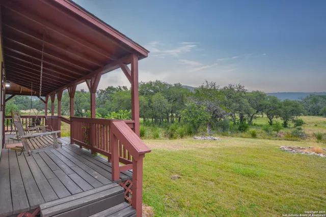 a view of a garden with a small pool