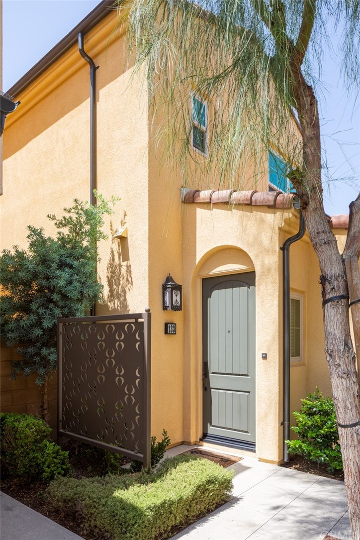 133 Excursion Irvine, CA 92618 - Photo 1 of 1 a front view of a house with garden