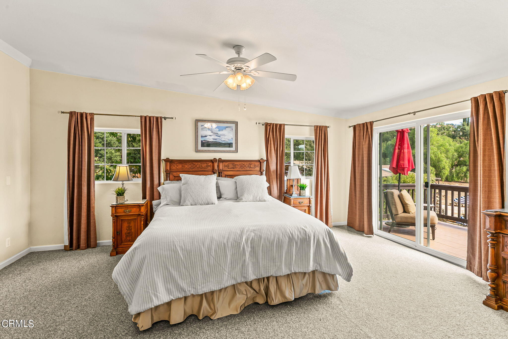 624 South Rice Road Ojai, CA 93023 - Photo 22 of 59 a bedroom with a bed and a large window
