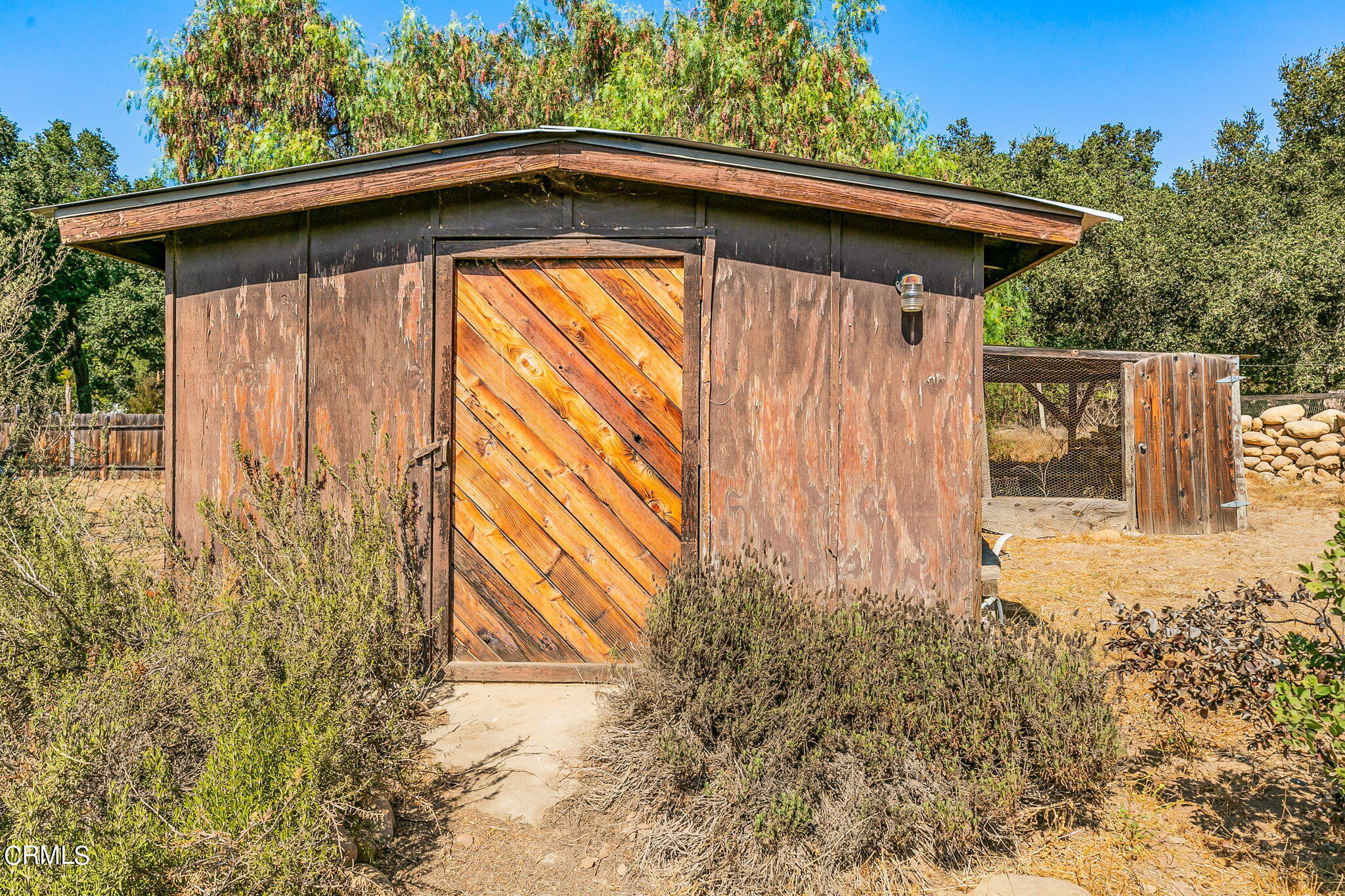 624 South Rice Road Ojai, CA 93023 - Photo 54 of 59 a backyard of a house with lots of green space