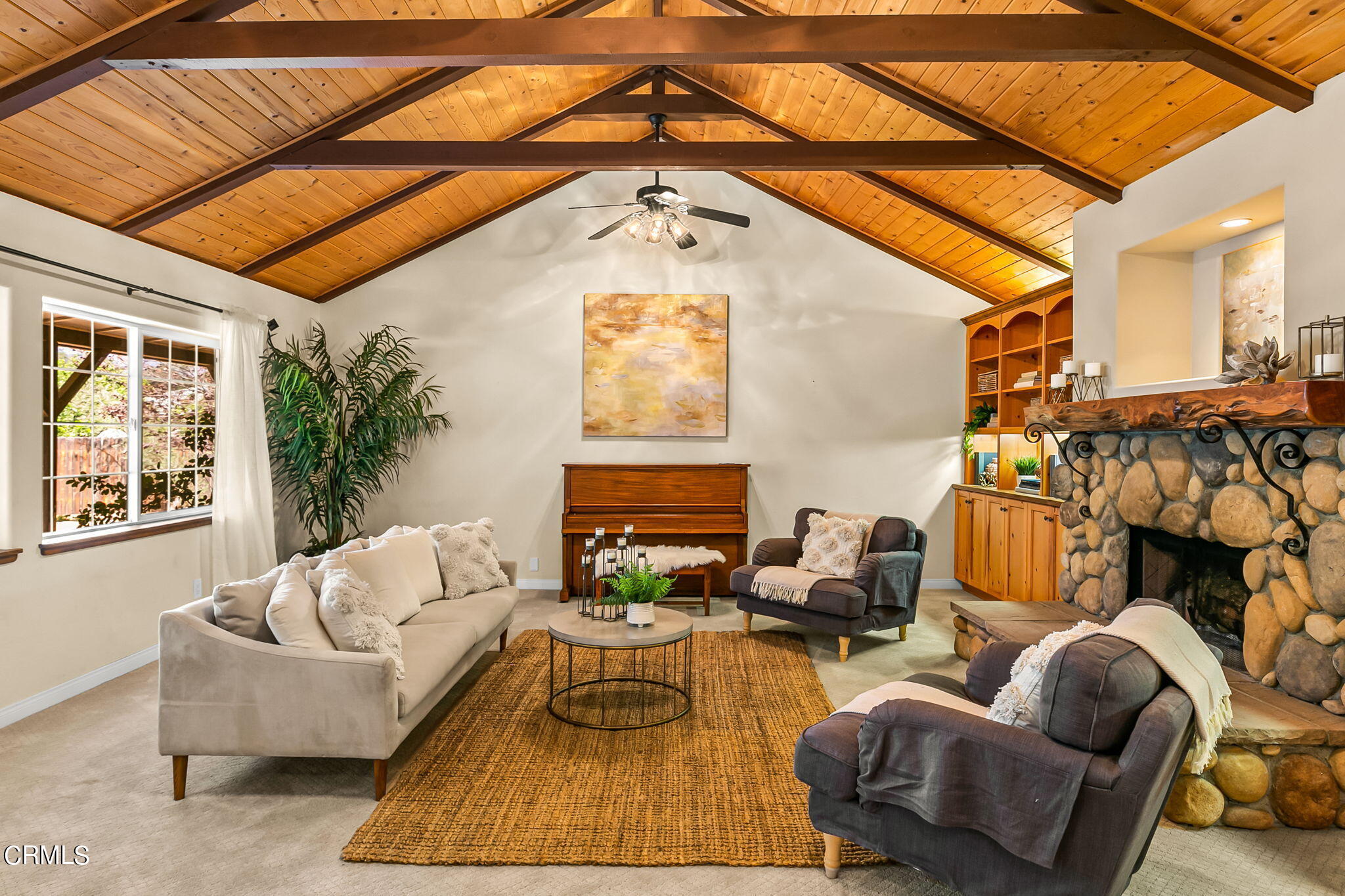 624 South Rice Road Ojai, CA 93023 - Photo 10 of 59 a living room with furniture and a fireplace