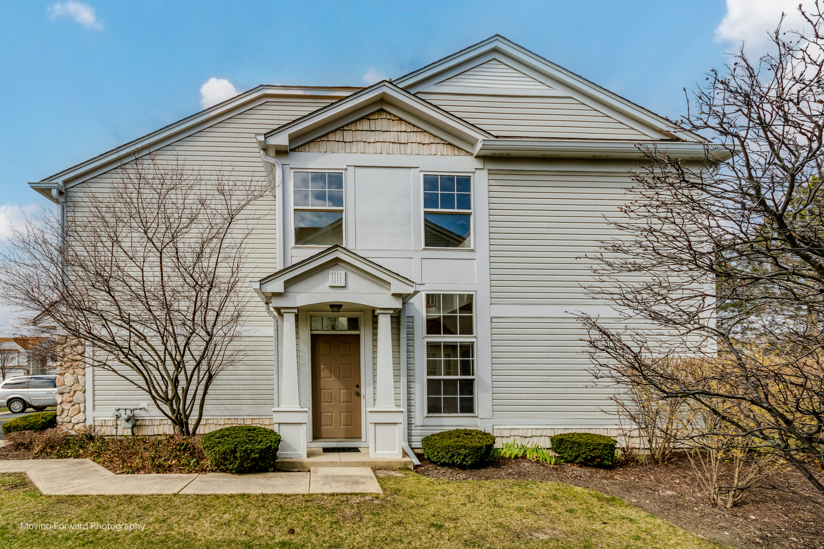 1086 Delta Drive Elgin, IL 60123 - Photo 3 of 29 a front view of a house with a yard