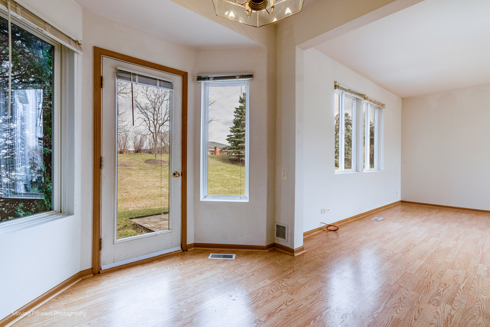 1086 Delta Drive Elgin, IL 60123 - Photo 8 of 29 an empty room with windows and closet