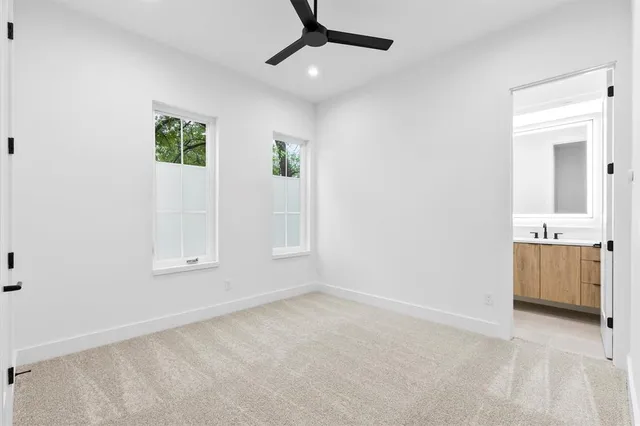 an empty room with a bathroom