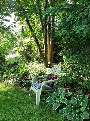 14-twenty First Street North Edgartown, MA 02539 - Photo 21 of 22 a backyard of a house with outdoor seating