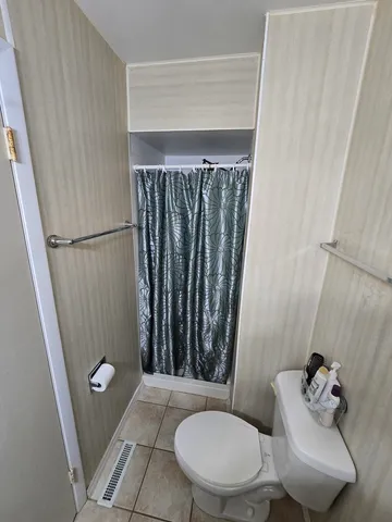 a bathroom with a toilet and a sink