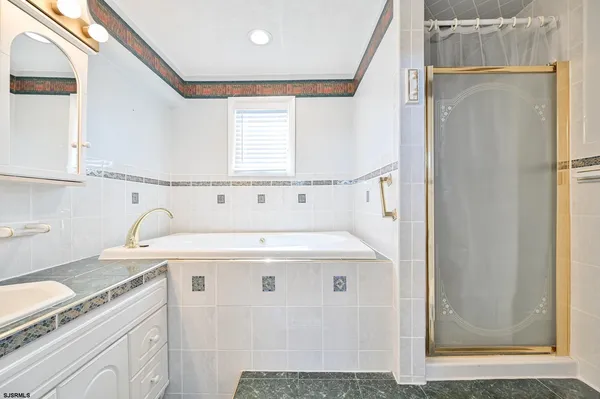 a utility room with a sink a washer and dryer