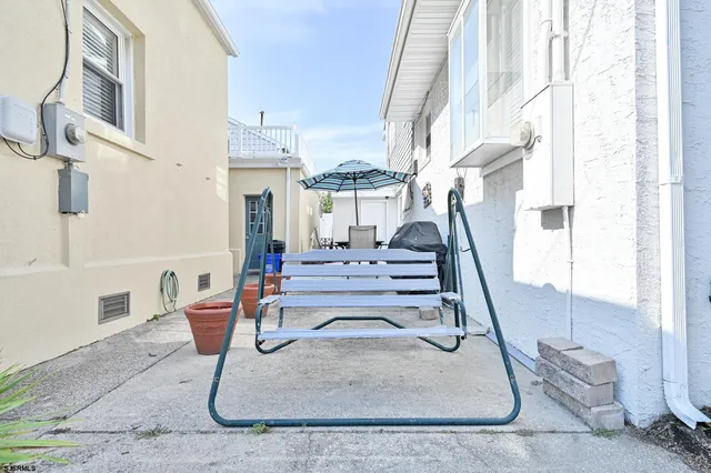 a view of a balcony with chairs