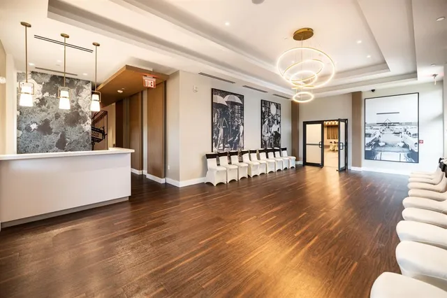 a kitchen with a sink a stove a refrigerator and cabinets