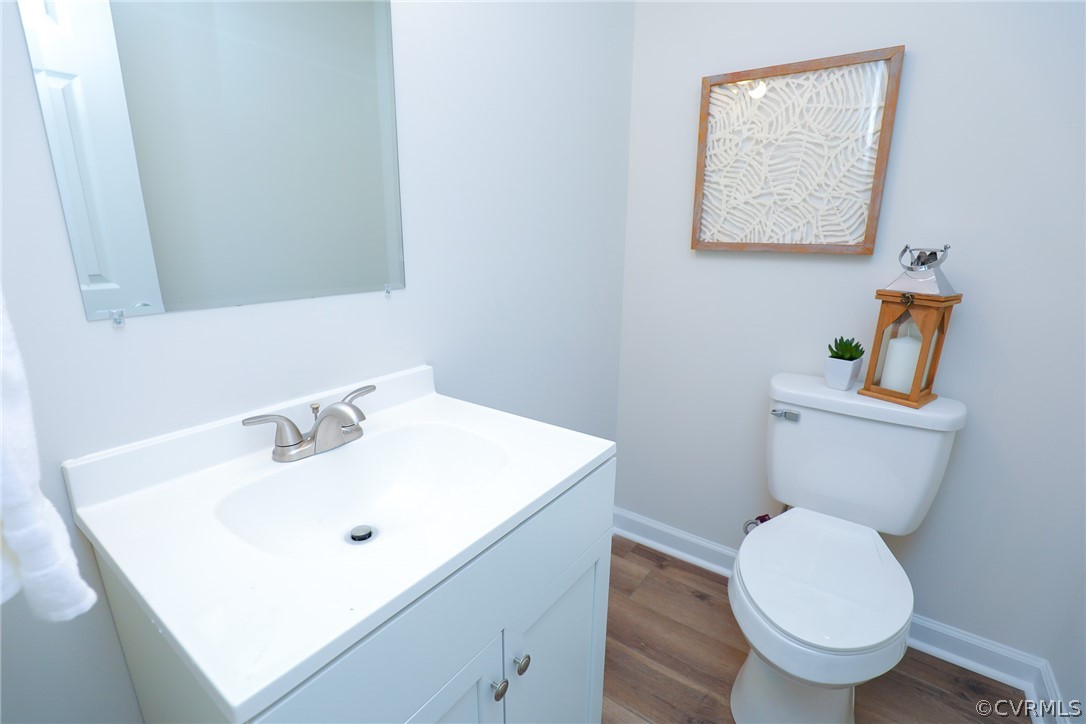 6029 Barrister Road Chesterfield, VA 23832 - Photo 27 of 50 a bathroom with a toilet sink and mirror