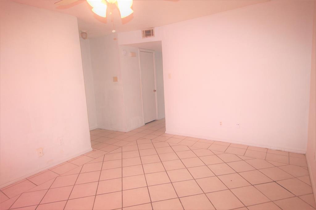8003 Rothington Road, Unit 53 Dallas, TX 75227 - Photo 5 of 11 a view of an empty room