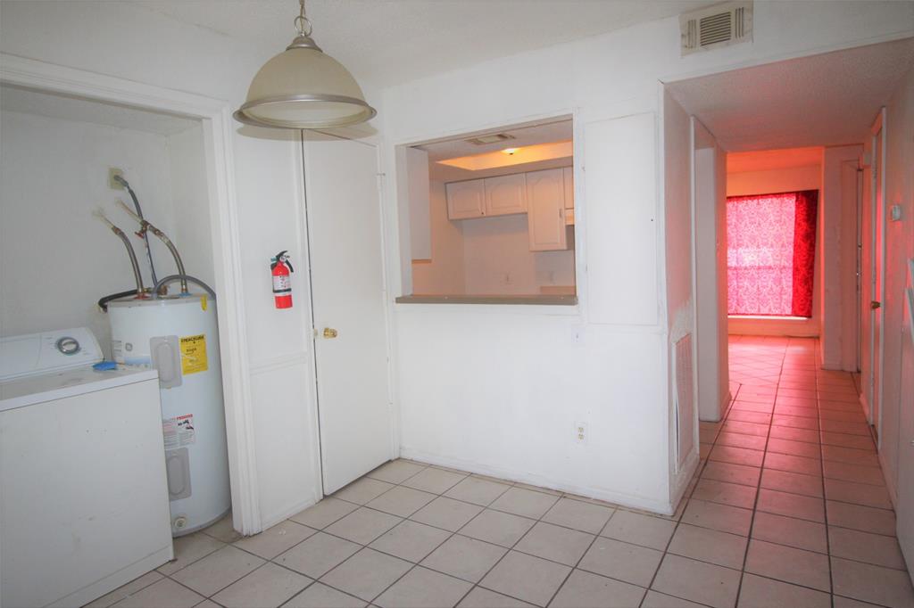 8003 Rothington Road, Unit 53 Dallas, TX 75227 - Photo 6 of 11 a view of utility room
