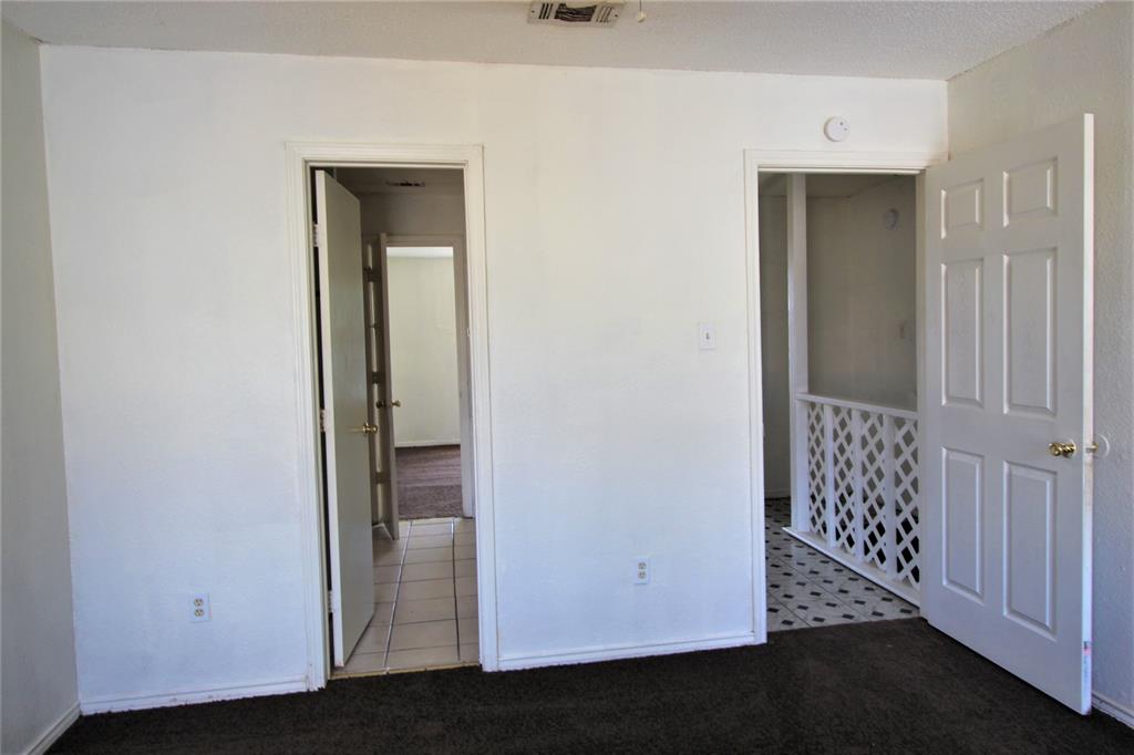 8003 Rothington Road, Unit 53 Dallas, TX 75227 - Photo 10 of 11 wooden floor in a gallery