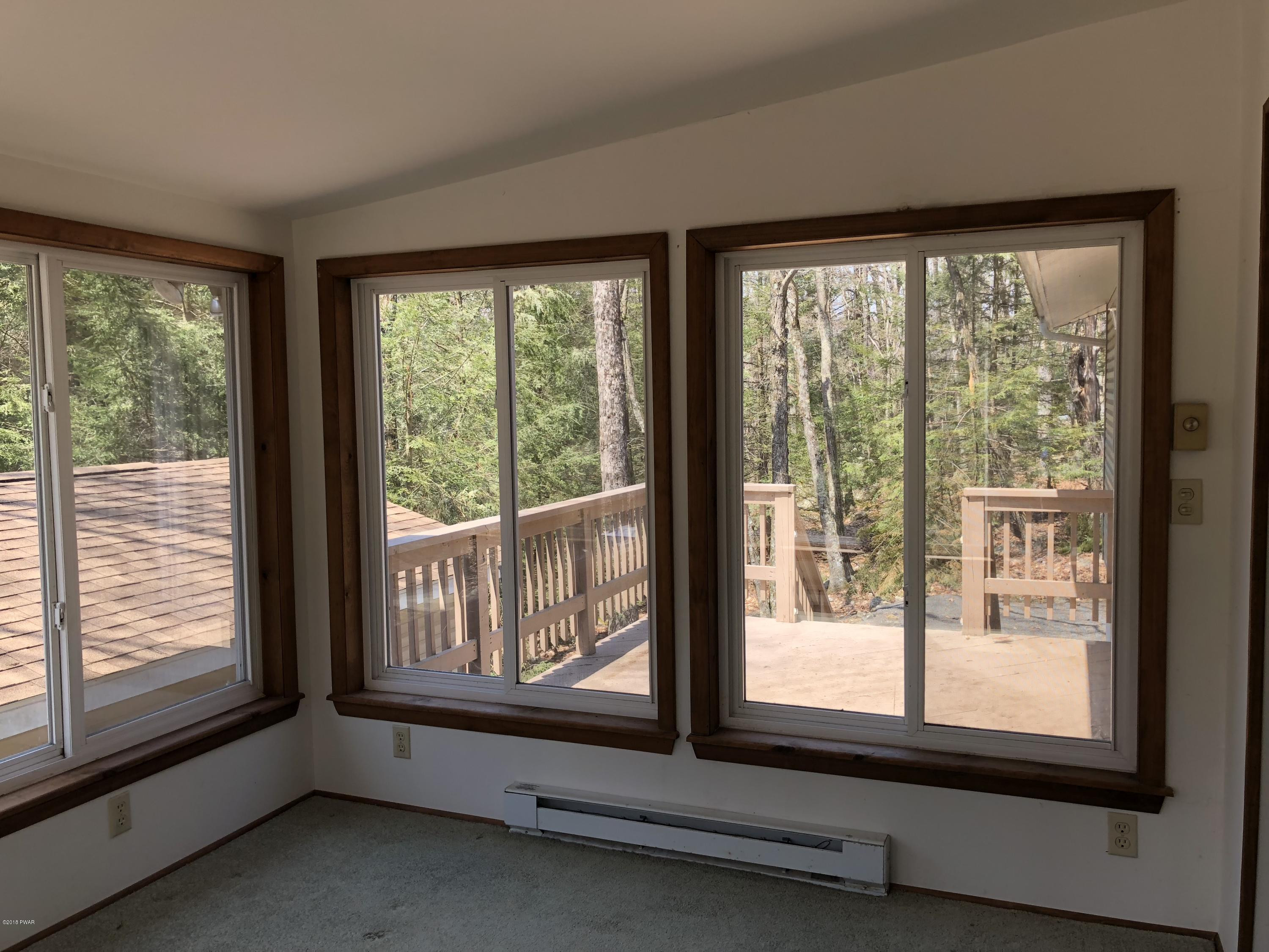 802 Conastoga Court Hawley, PA 18428 - Photo 9 of 37 10 sunroom