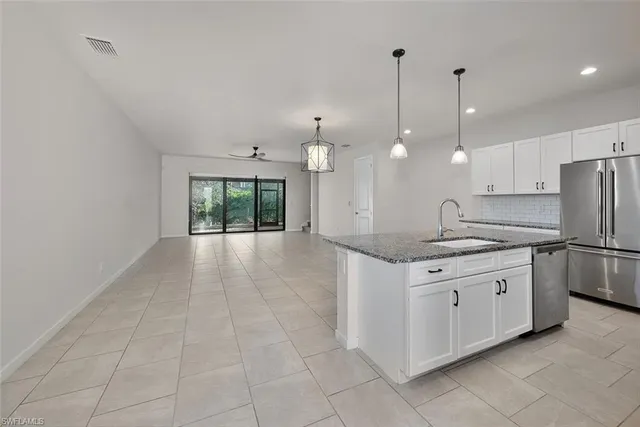 $720,000 | 13010 Pembroke Drive, Naples, FL 34105