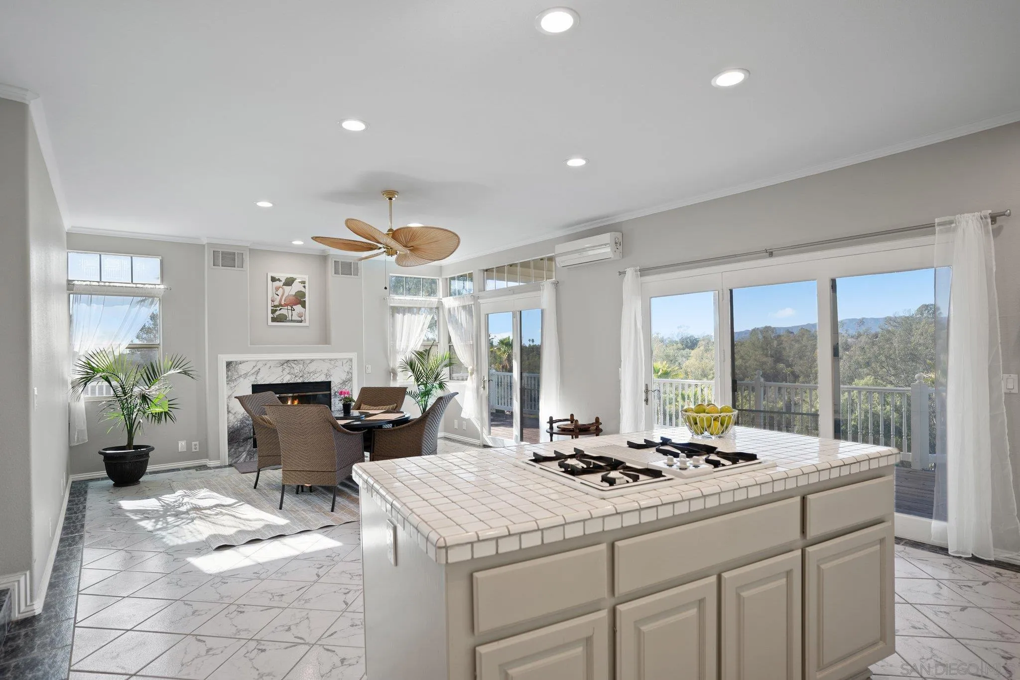 1267 Palomino Road Fallbrook, CA 92028 - Photo 11 of 34 a kitchen with a sink stove and cabinets