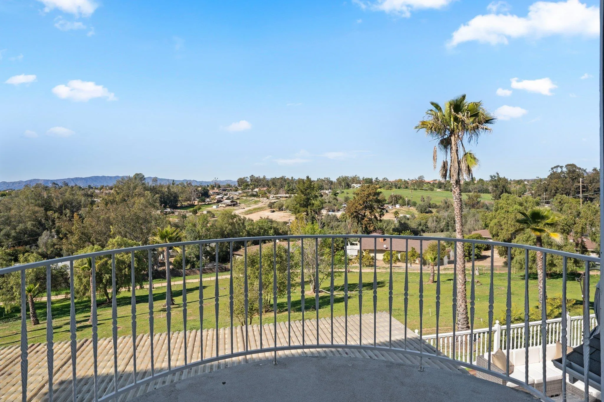1267 Palomino Road Fallbrook, CA 92028 - Photo 21 of 34 a view of a city and a lake view