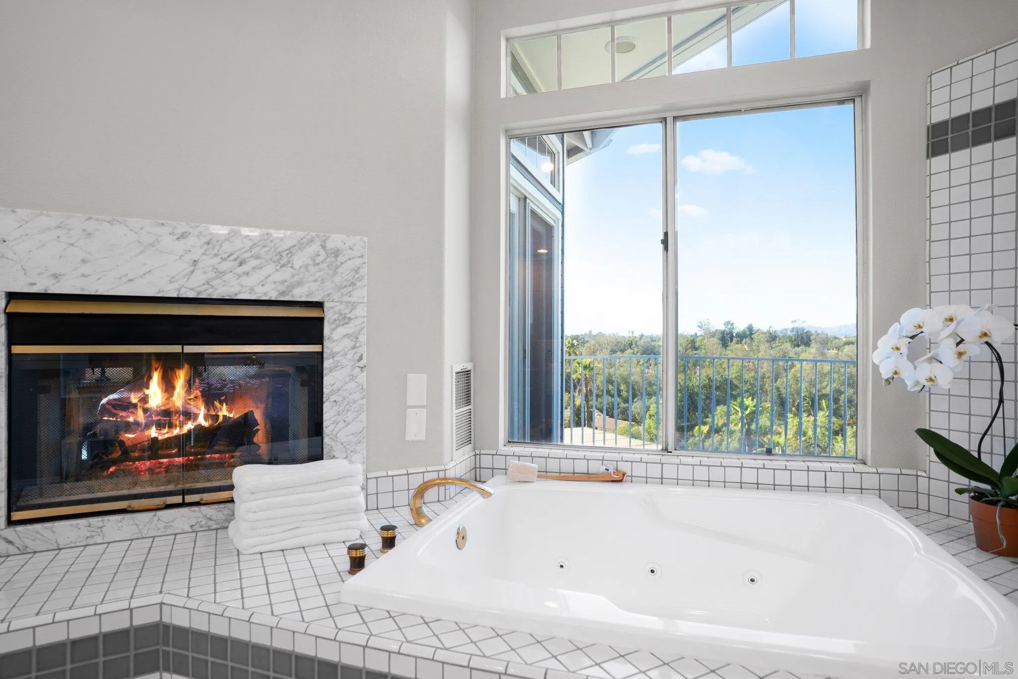 1267 Palomino Road Fallbrook, CA 92028 - Photo 24 of 34 a bathroom with a tub and a large window