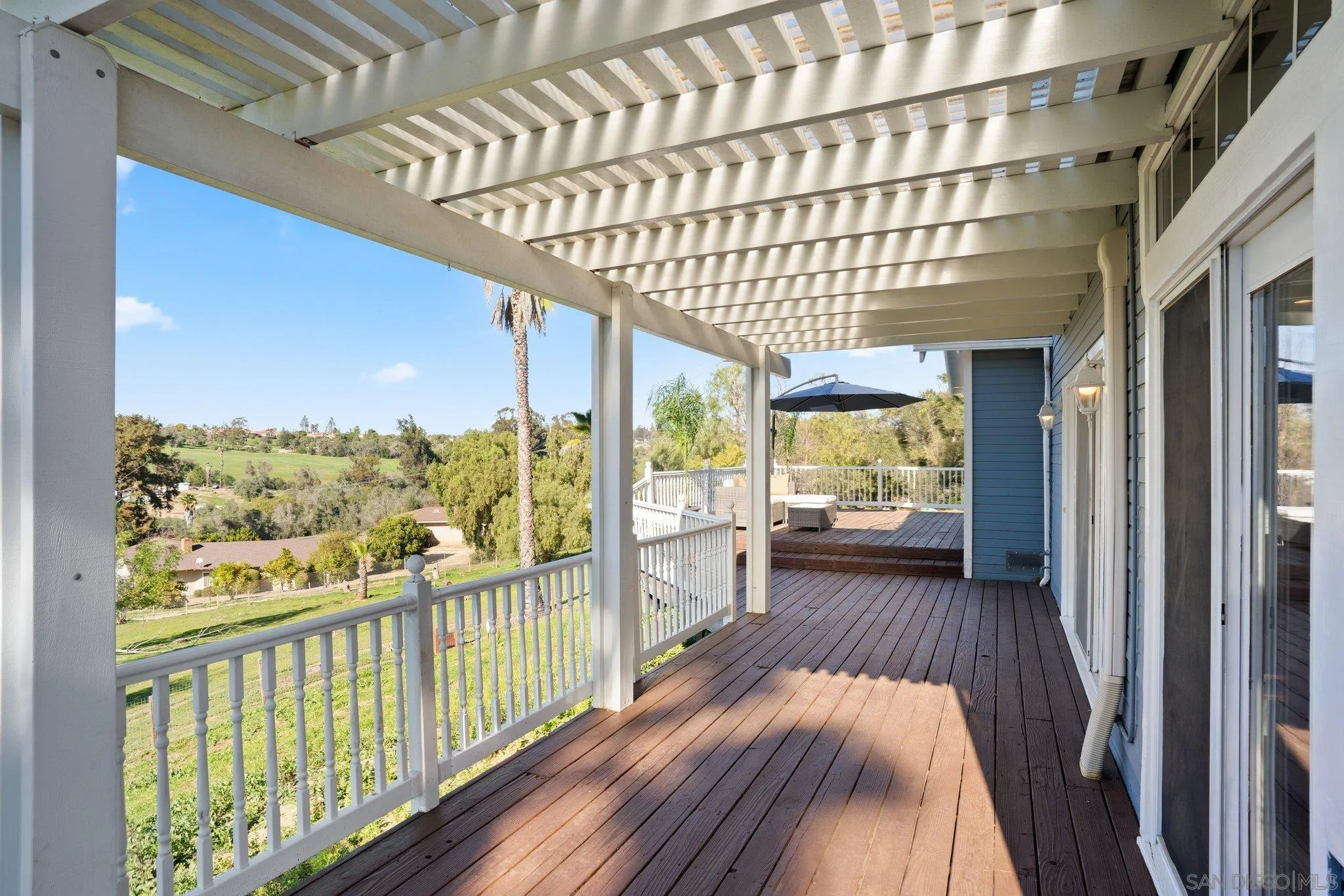 1267 Palomino Road Fallbrook, CA 92028 - Photo 26 of 34 a view of balcony with wooden floor
