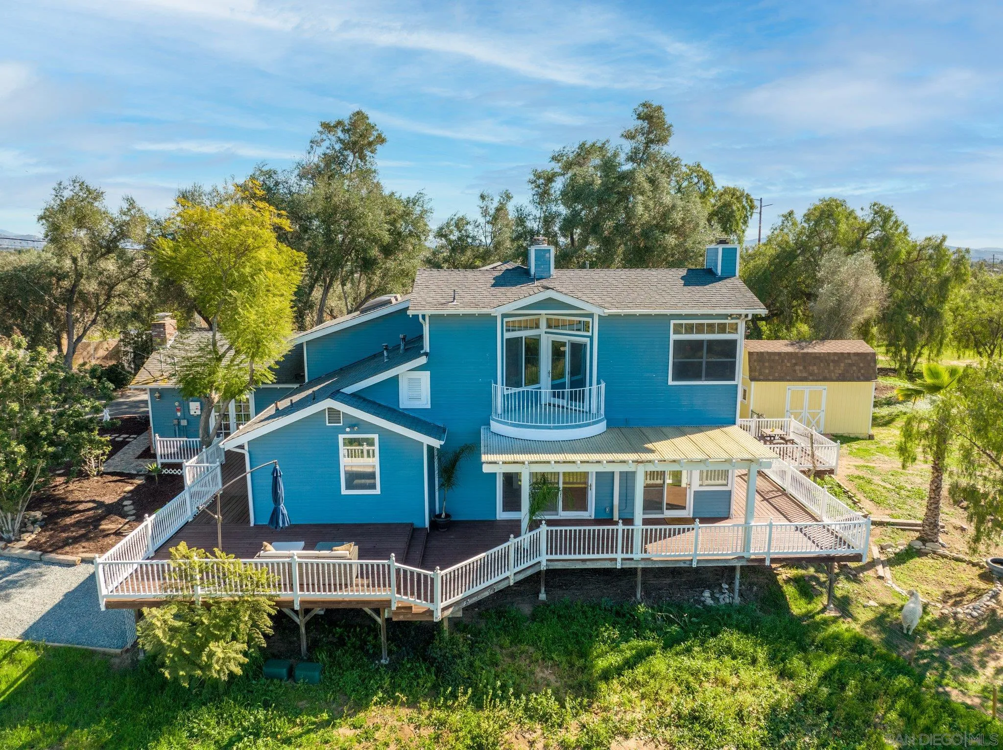 1267 Palomino Road Fallbrook, CA 92028 - Photo 3 of 34 an aerial view of a house with a yard