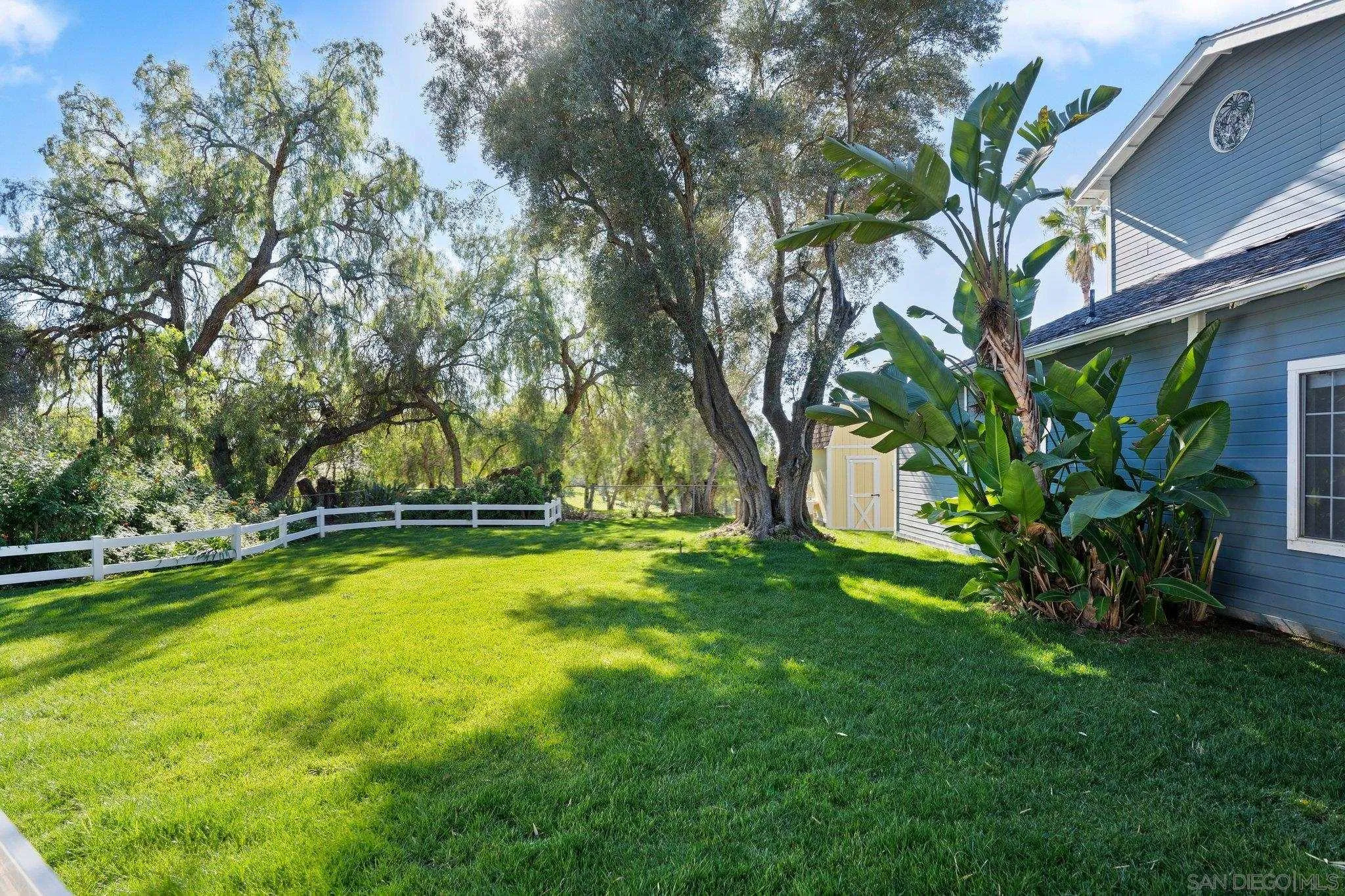 1267 Palomino Road Fallbrook, CA 92028 - Photo 5 of 34 a view of swimming pool with an outdoor space and seating area