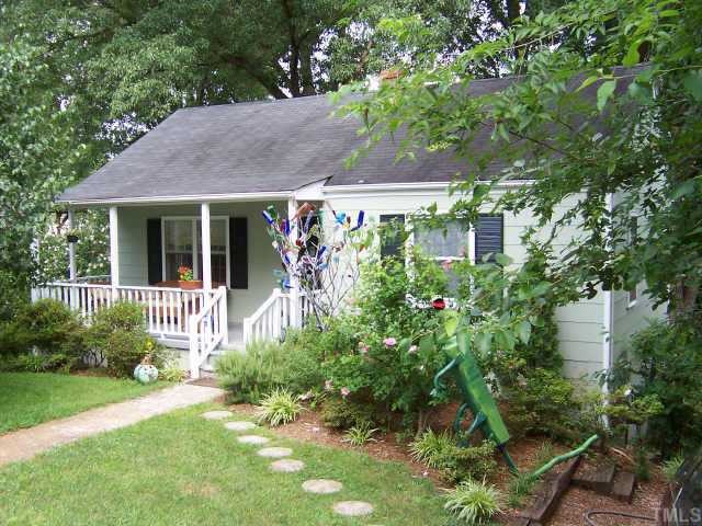 804 Brighton Road Raleigh, NC 27610 - Photo 1 of 1 a view of an house with backyard space and garden