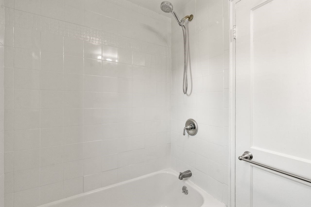 57 Pierce Road, Unit 57 Watertown, MA 02472 - Photo 13 of 22 a bathroom with a shower