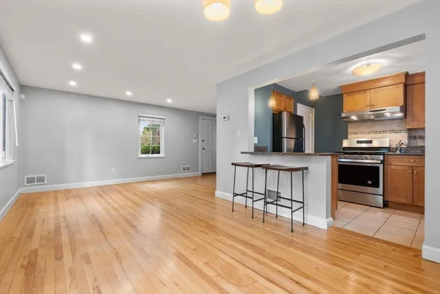 a view of kitchen with microwave and stove