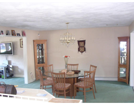 39 Locust Street Burlington, MA 01803 - Photo 5 of 5 a dining room with furniture and window