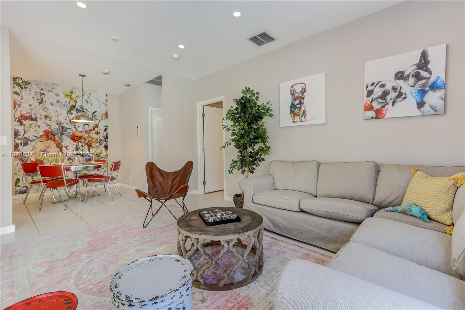 Bonaventure Lakes Weston, FL 33326 - Photo 14 of 52 a living room with furniture and a potted plant