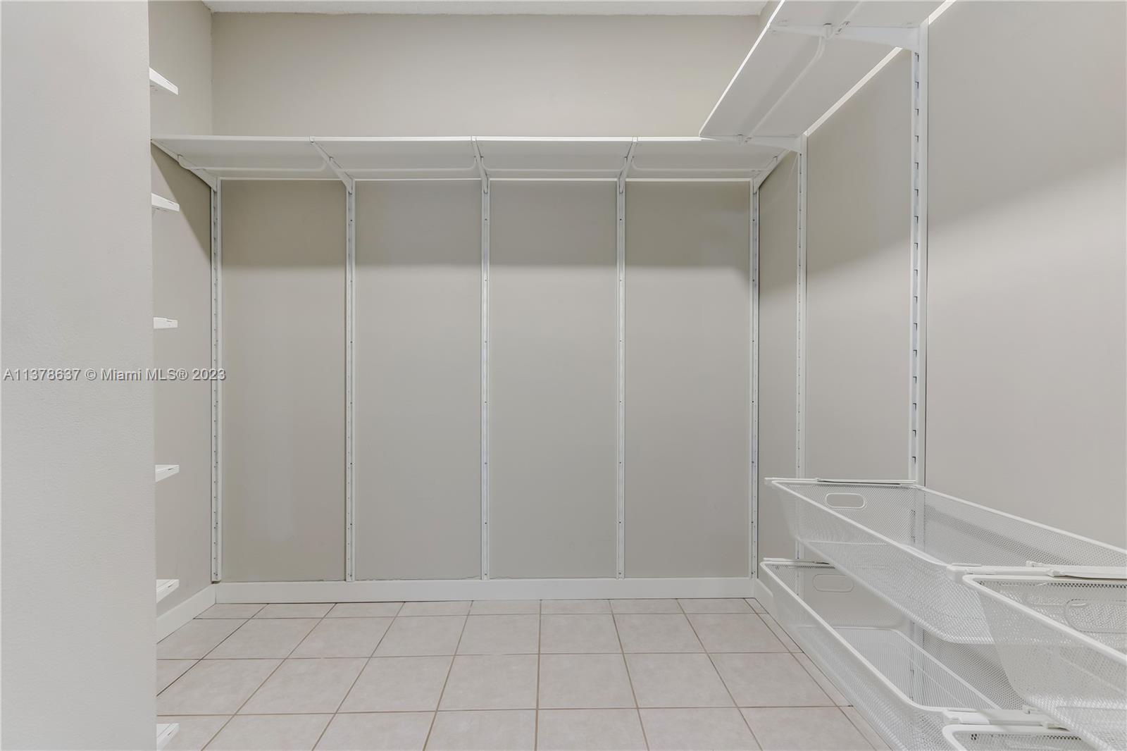 Bonaventure Lakes Weston, FL 33326 - Photo 19 of 52 a view of an empty walk in closet