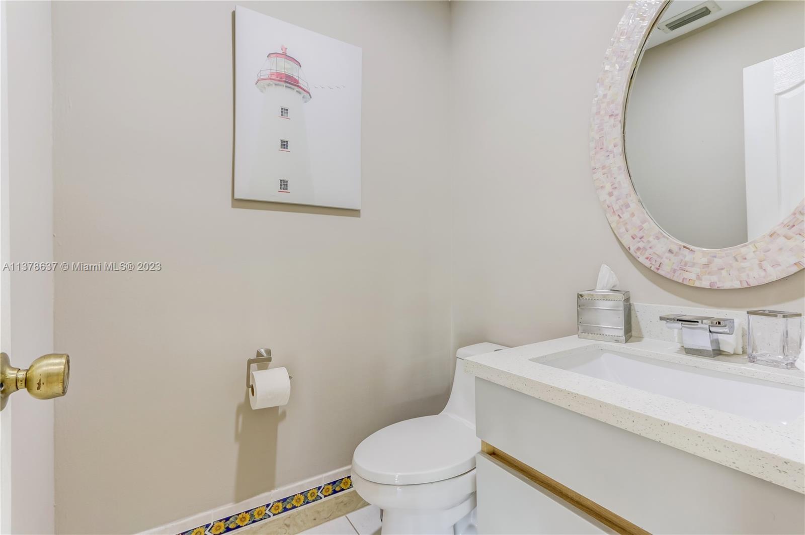 Bonaventure Lakes Weston, FL 33326 - Photo 20 of 52 a bathroom with a toilet sink and mirror