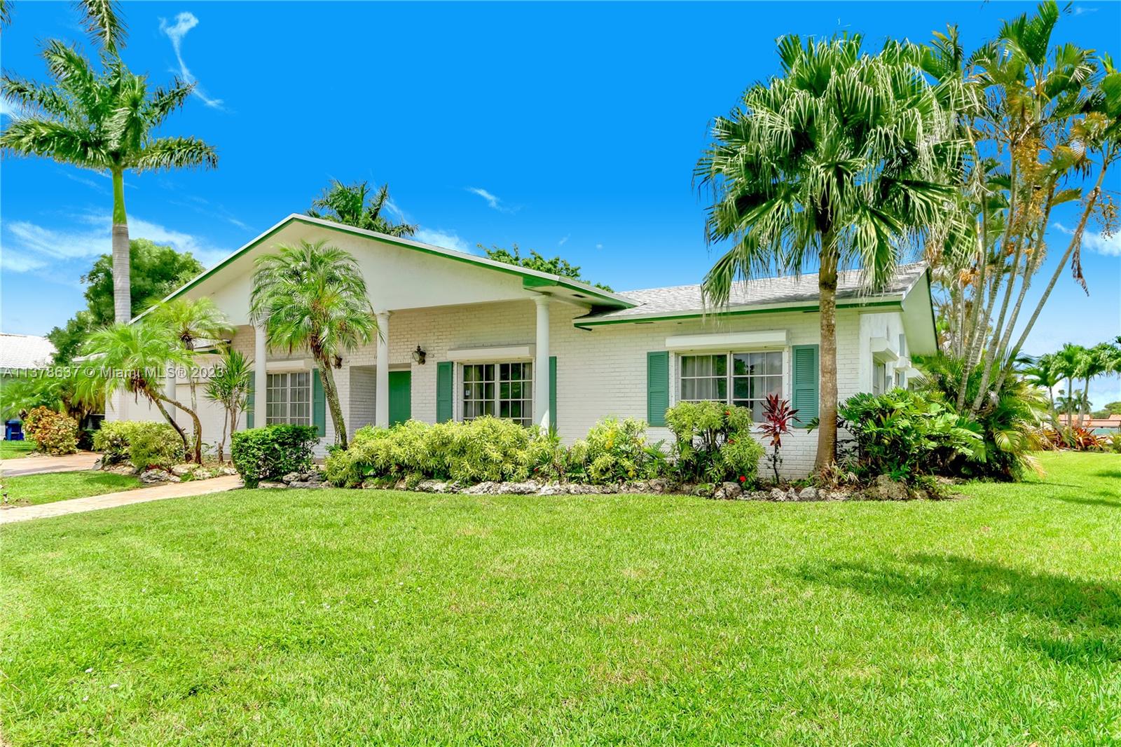 Bonaventure Lakes Weston, FL 33326 - Photo 2 of 52 a front view of house with yard and green space