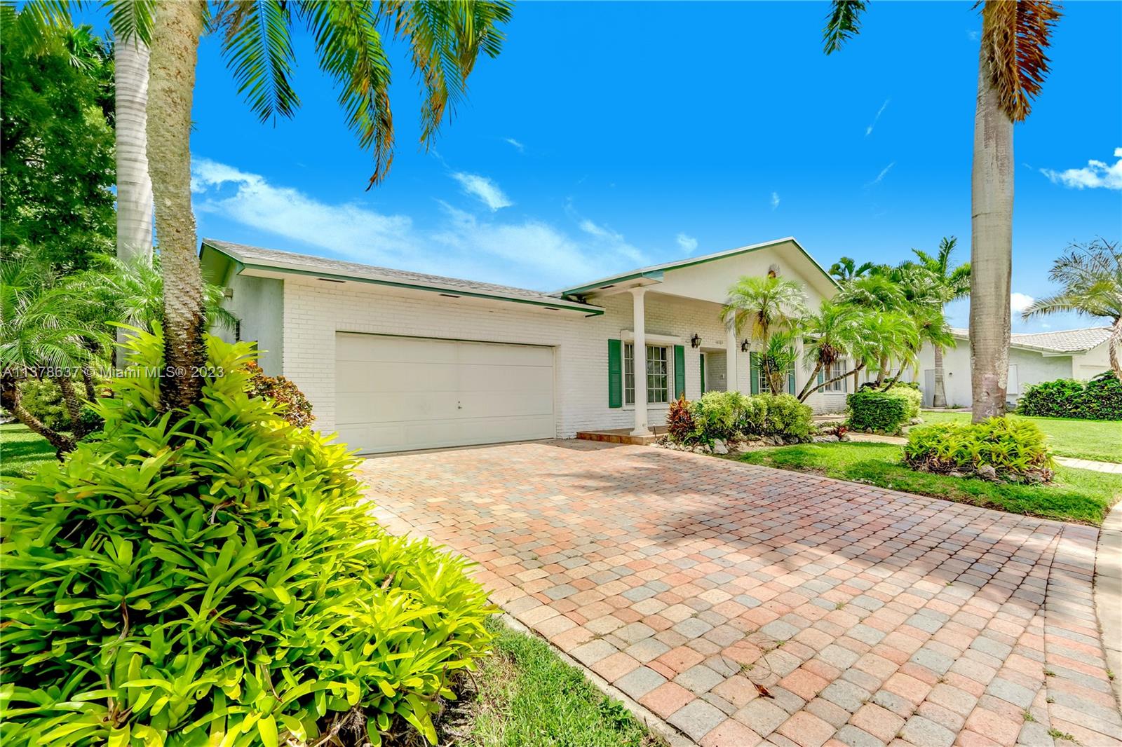 Bonaventure Lakes Weston, FL 33326 - Photo 3 of 52 front view of a house with a yard