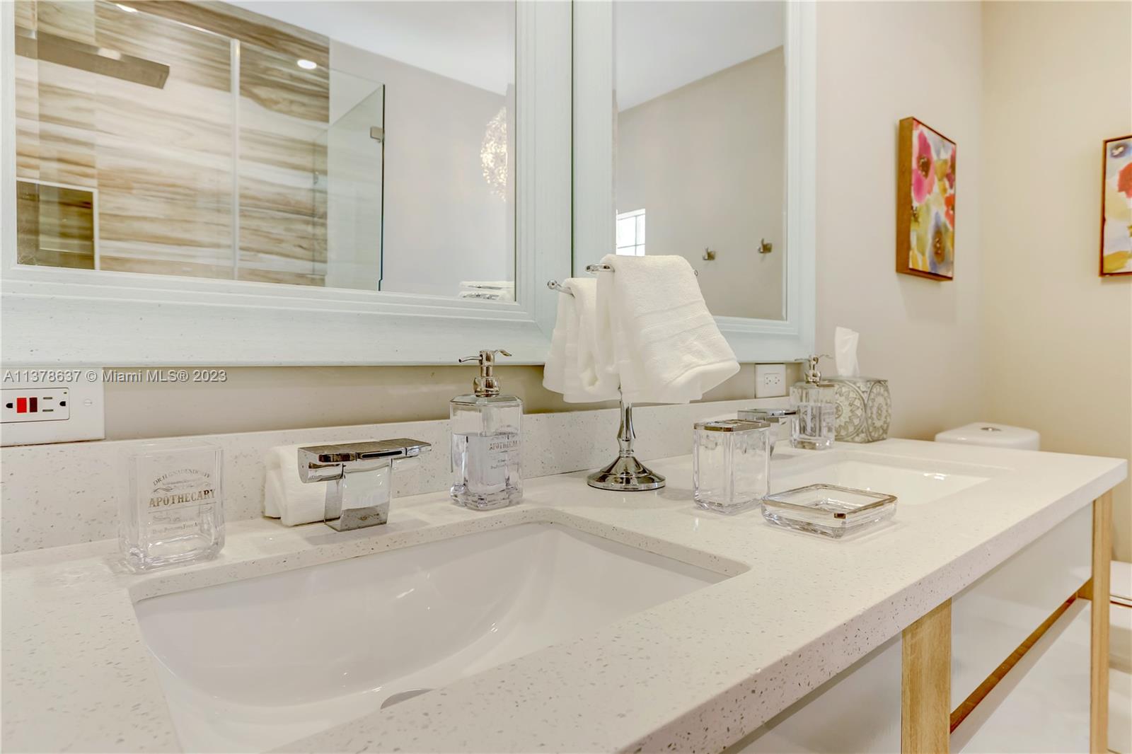 Bonaventure Lakes Weston, FL 33326 - Photo 38 of 52 a bathroom with a sink and a mirror