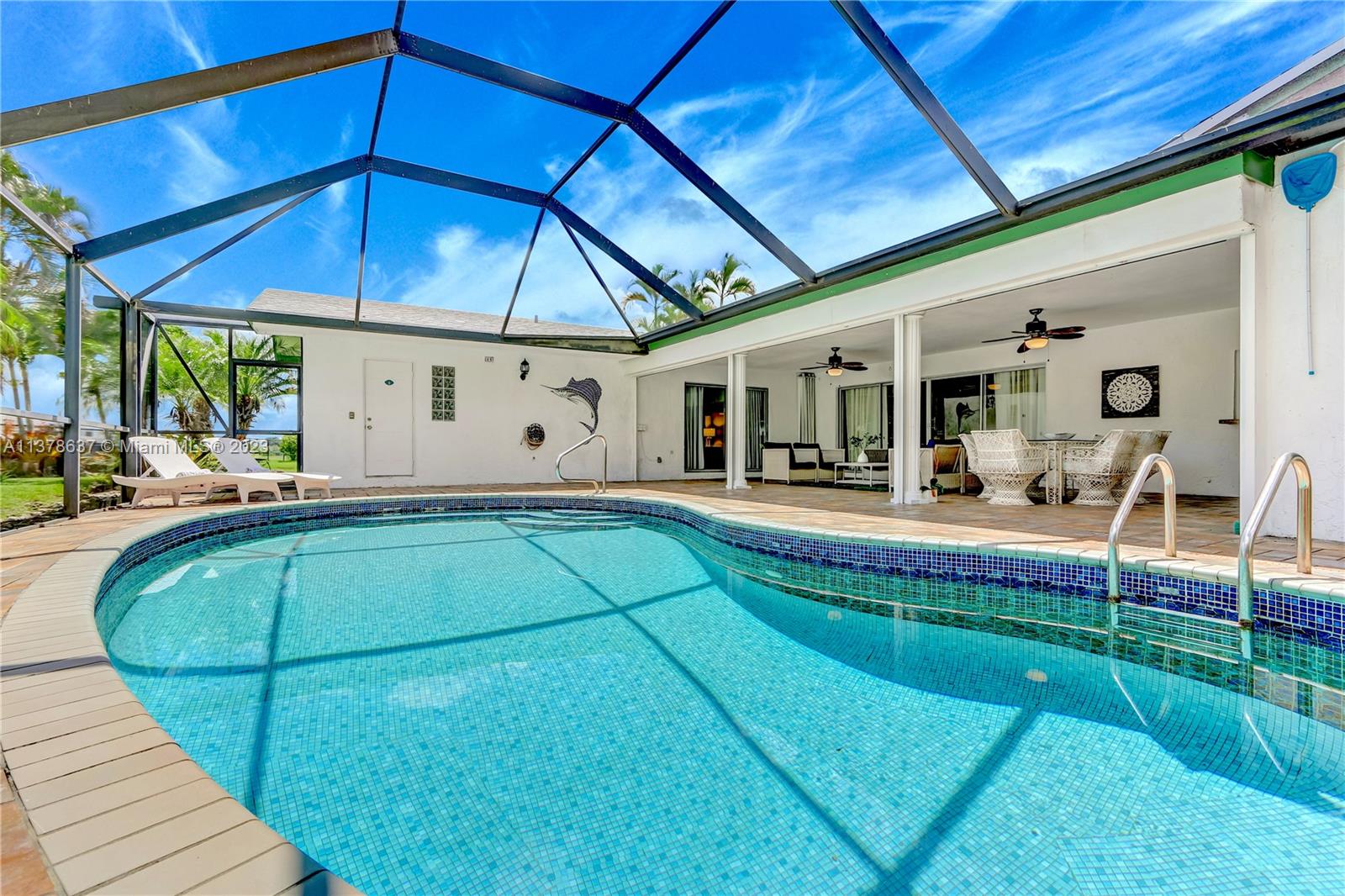 Bonaventure Lakes Weston, FL 33326 - Photo 43 of 52 a view of a swimming pool with a patio