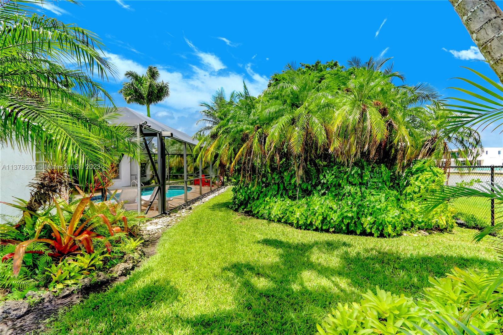 Bonaventure Lakes Weston, FL 33326 - Photo 46 of 52 a backyard of a house with lots of green space