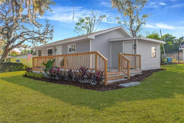 a view of a house with garden