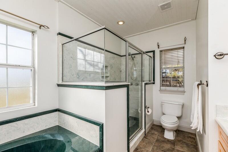 1510 Vinson Ray Road Baker, FL 32531 - Photo 30 of 60 a bathroom with a granite countertop sink a toilet and shower