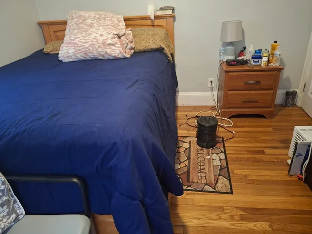 a bathroom with a sink a mirror and shower