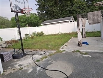 333 Lynnfield Street Lynn, MA 01904 - Photo 19 of 23 a view of a backyard with a sink and garden