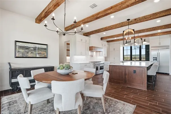 a view of a dining room with furniture