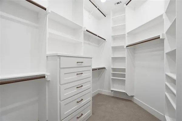 a view of an empty walk in closet