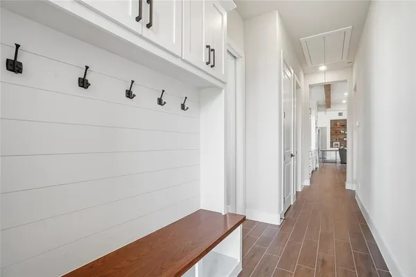 a view of a hallway with closet
