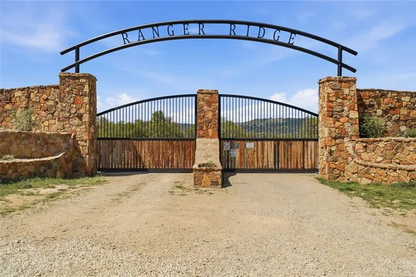a view of staircase with wooden floor