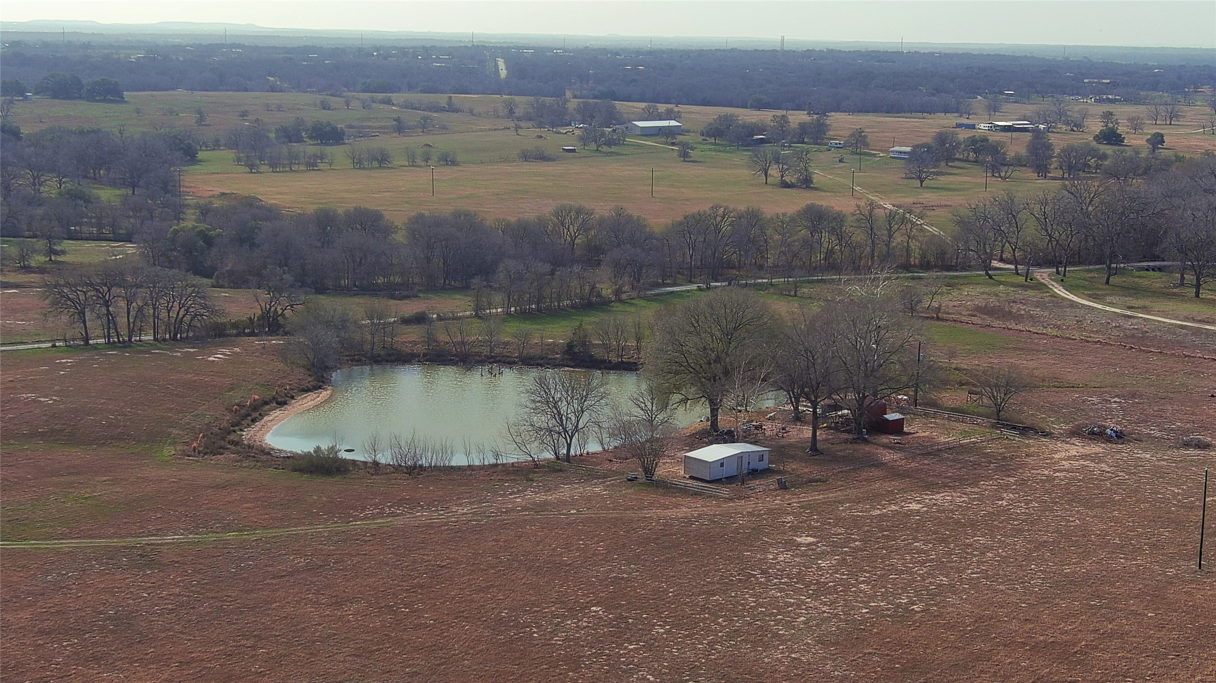 5510 Old McMahan Road Lockhart, TX 78644 - Photo 6 of 10 a view of a lake in middle of the town